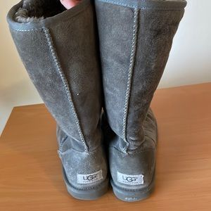 UGG boots. Tall. Size 6. Dark grey in color. No rips or tears.
